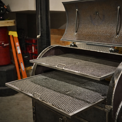 Removable steel cooking grates pulled out of the 80-Gallon King offset smoker